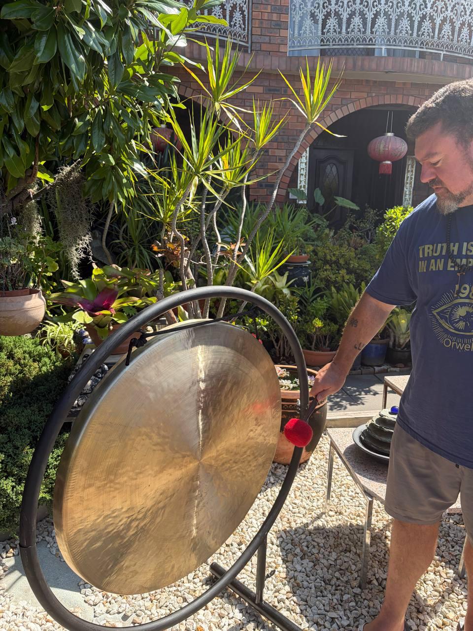 Luke Collins with gong and mallet ready for a session